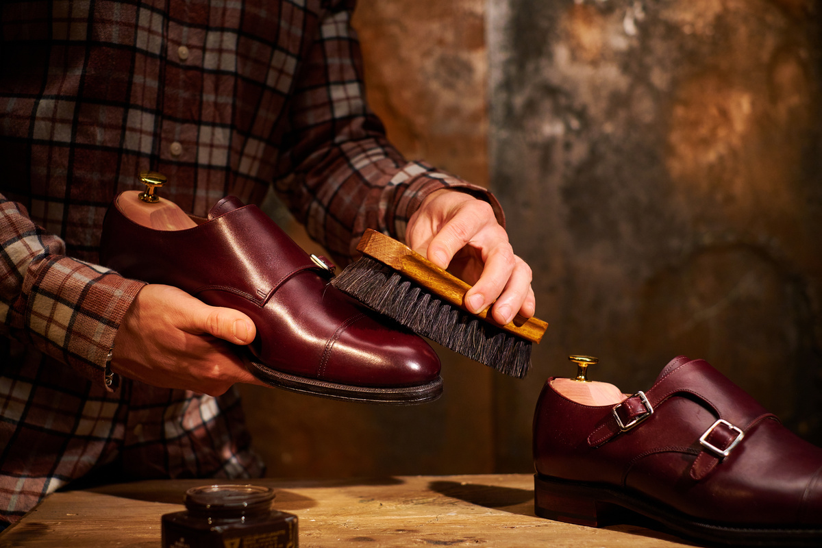 Man Polishing Leather Shoes